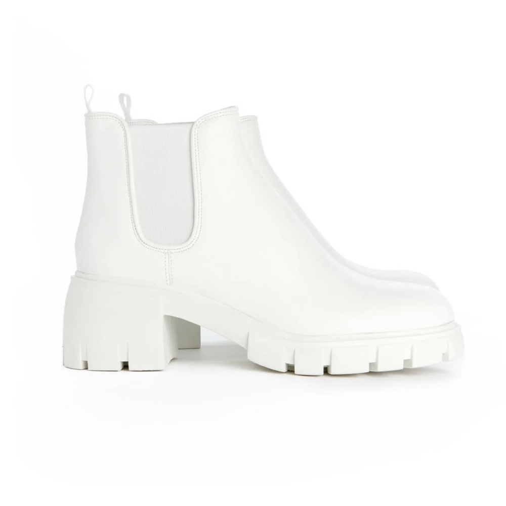 Steve Madden white booties.